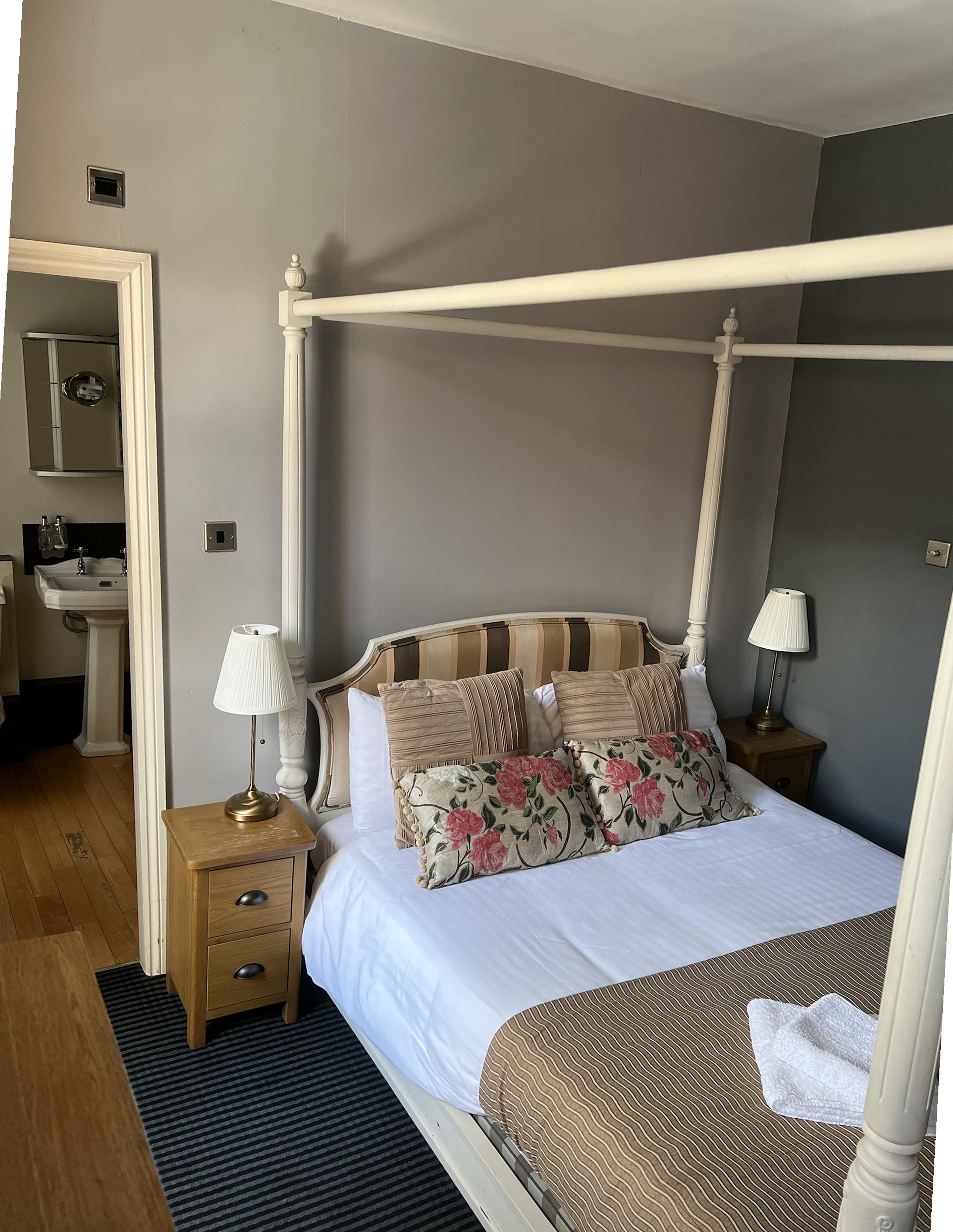 Four poster bed in the Four Poster Double honeymoon suite at The Silk House